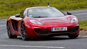 Illustration for article titled Ferrari's public option, the McLaren MP4-12C super car gets emotional, and Scion's iQ shows up